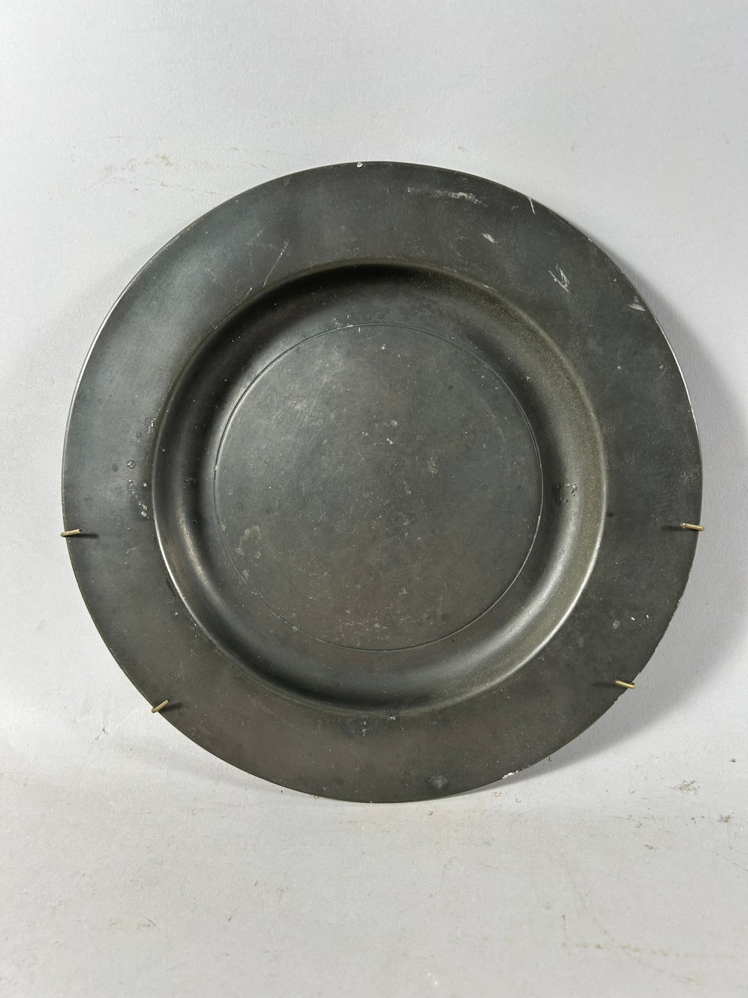 Vintage/Antique England Pewter Plate: Vintage/Antique England Pewter Plate. 1"h x 9"w (diameter)