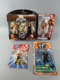 Lot of 4 - WWE and WWF Action Figures in Original Boxes: Undertaker, Live Wire. Oven Heart, Series