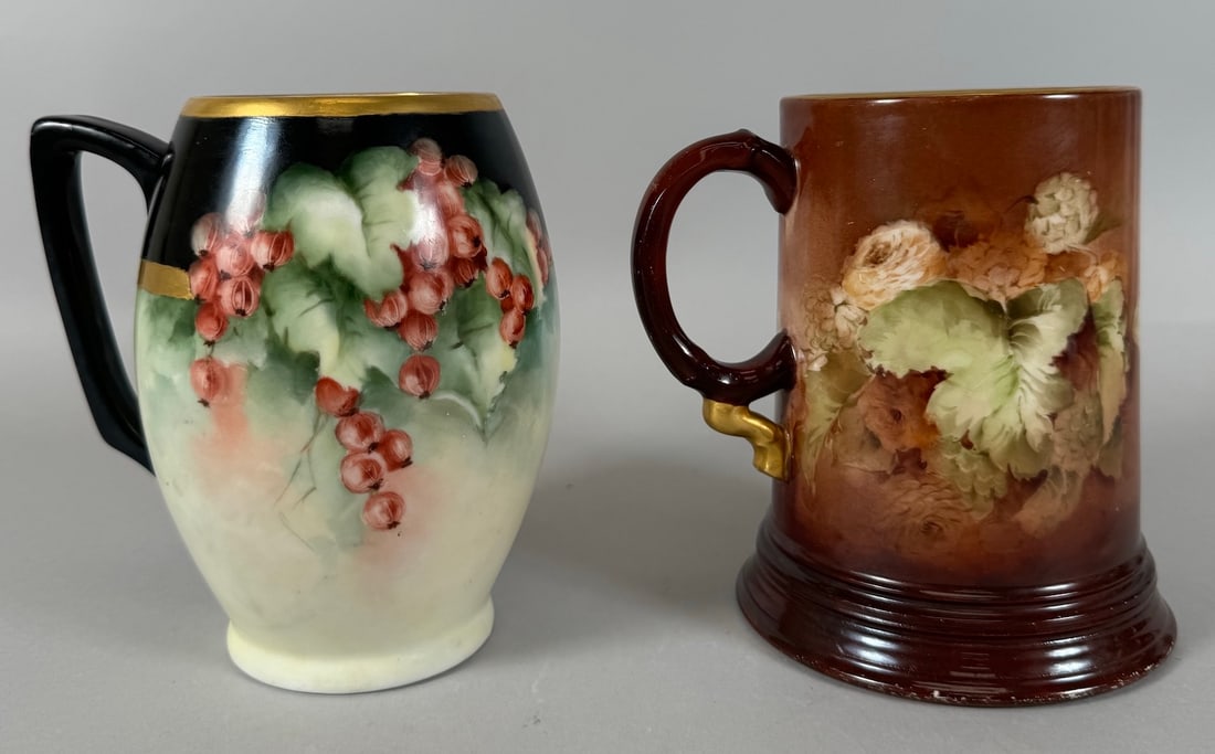 Lot of 2 - Vintage Gold Rimmed Mugs. JPL Jean Pouyat Limoges & Bavarian Mug: Vintage large mugs. 1- JPL Jean Pouyat Limoges France. 2- Bavarian Mug. Gold rimmed and hand painted. D: Largest 5.50" h x 3"d, smallest 5.25"h x 4.25"d.
