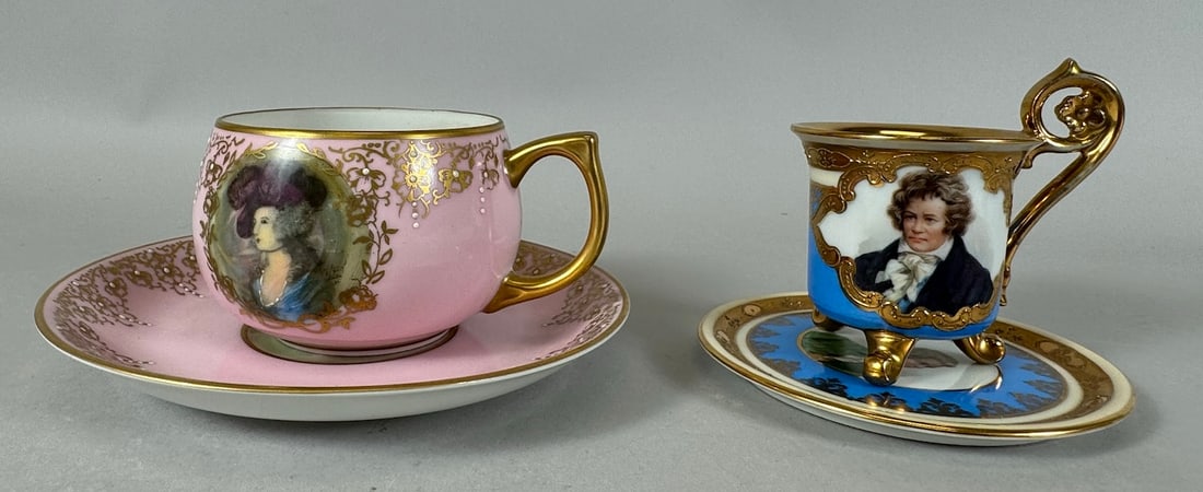 Lot of 2 - Gold Trim Portrait Tea and Expresso Cup with Saucer: Possibly hand painted, two gold trimmed portrait tea cups with saucers. 1- Gold trim, pink color lady portrait tea cup and saucer. Possibly a French Porcelain. 2- Blue color, gold trimmed, gentleman p