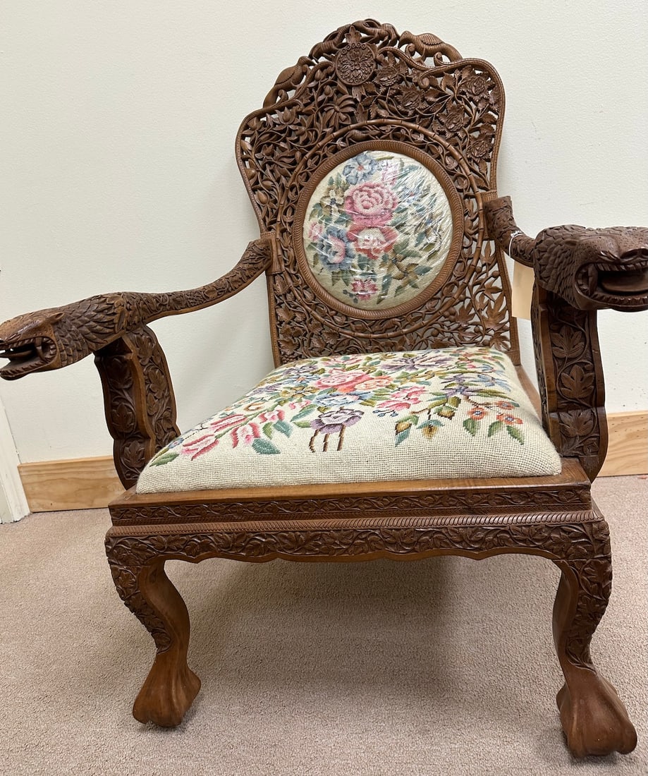 Hand Carved Wooden Armchair: Hand Carved Wooden Armchair with embroidered fabric. D: 38 H x 24 W x 22 D.