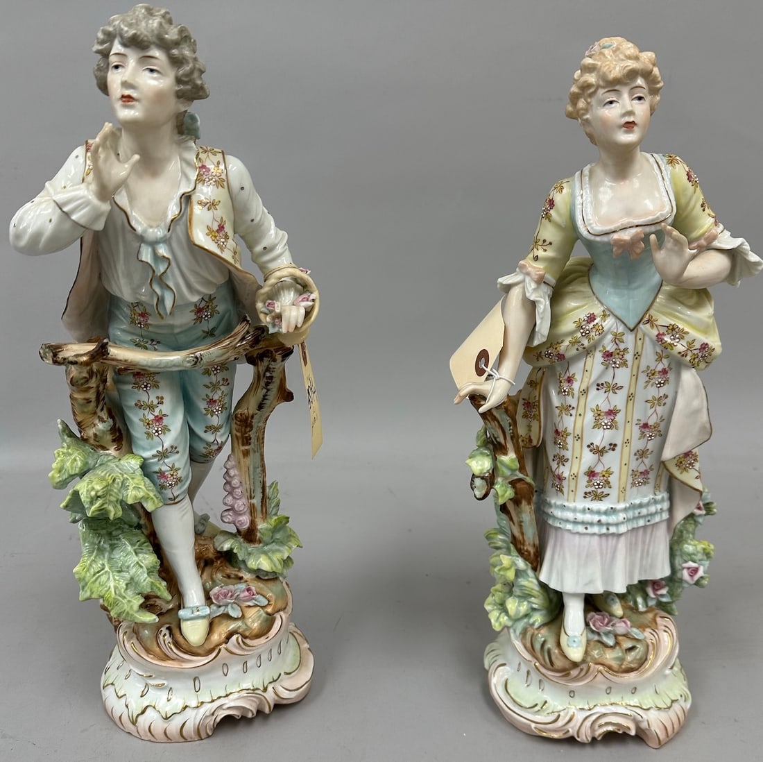 Pair of Vintage German Kalk Porcelain Figurines: Pair of German Kalk Porcelain Figures. A man and a women. Hand-painted. D: 15 H x 5 W x 4 D.