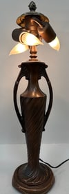 Tiffany-Inspired a Bronze Finish Urn - Shaped Base Lamp.