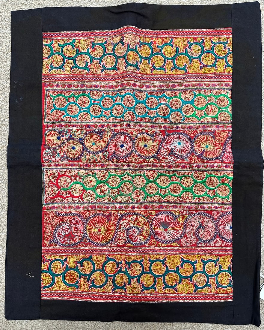 Vintage Embroidered Hand-Stitched Baby Carrier: Antique/vintage embroidered Chinese hand-stitched baby carrier from S.China. On cotton black fabric with embroidery in red, orange, yellow, green, blue and white. Design intricates floral motifs, geom