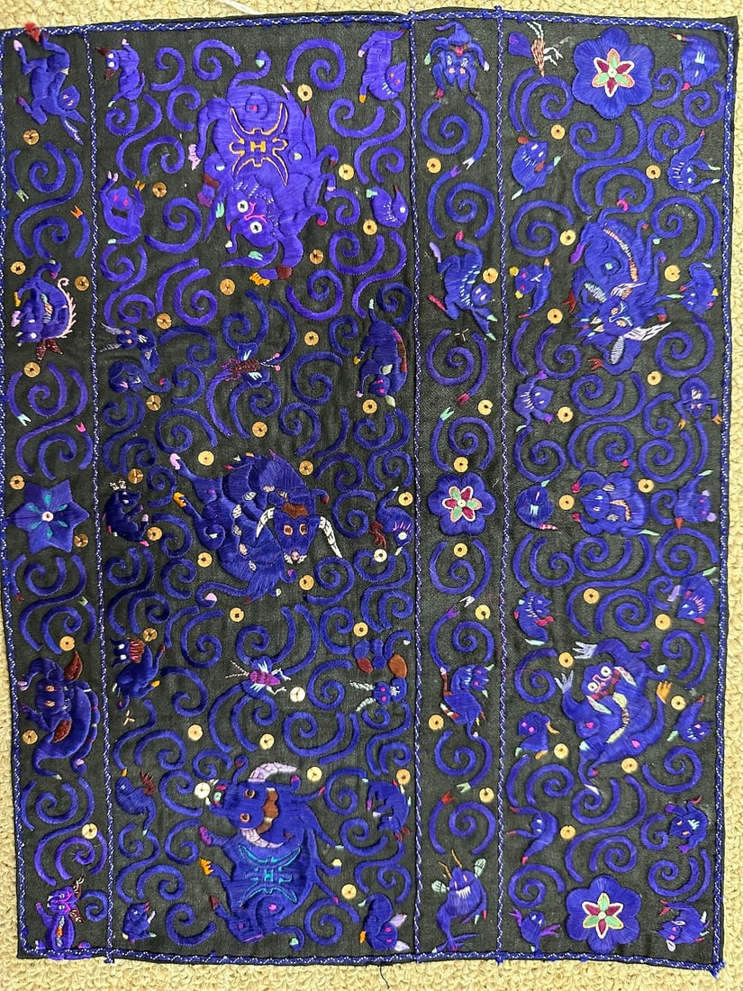 Embroidered Vintage Chinese Textile: Vintage Chinese textile on a black cotton fabric with purple silk thread embroidered with pattern of stylized cats and mice engaged with playful interactions. D: 9" W x 11.50" L.