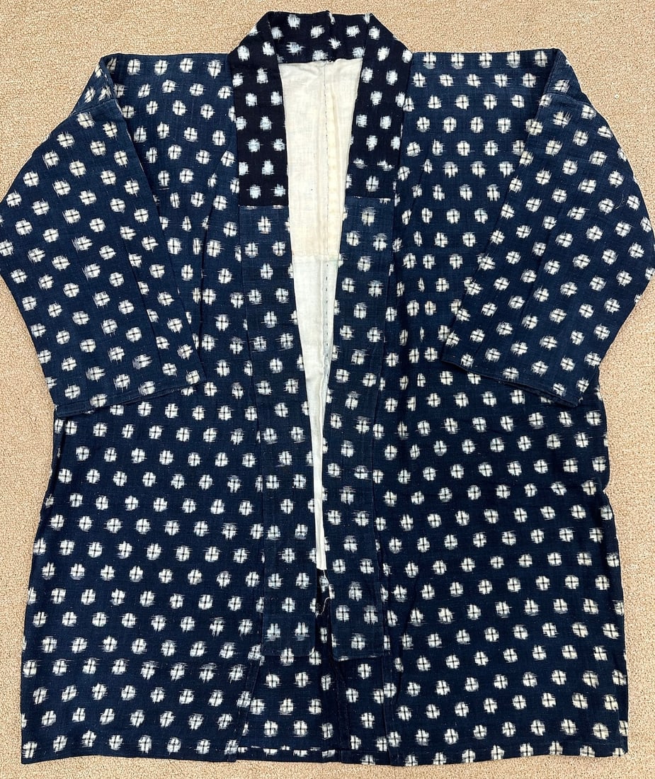 Handsewn Vintage Ikat Peasant Kimono: Handsewn traditional indigo ikat peasant cotton kimono. D: 25" W x 31" L.