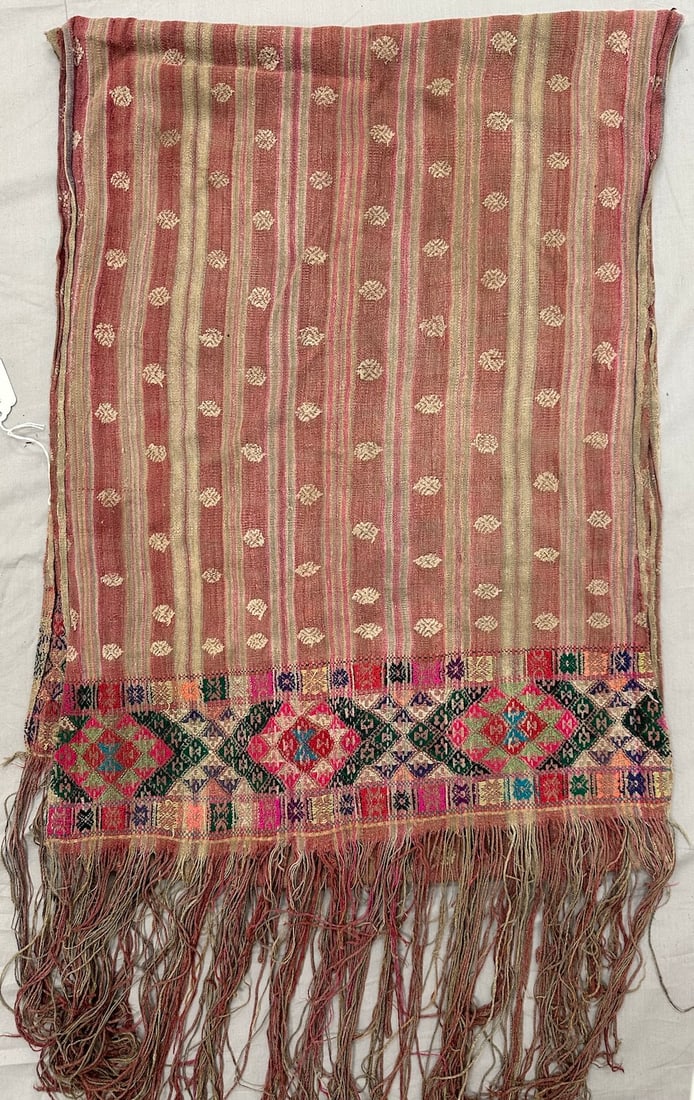 Bhutan Raw Silk Waist Band Sash: Bhutan raw silk waist band sash with repeating pattern in muted colors and fringes. D: 16" x 88".