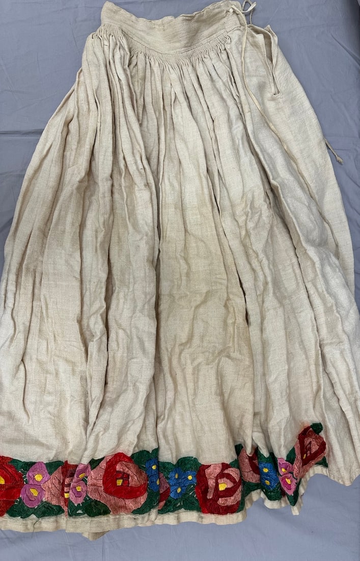 Vintage Handmade Linen Central American Skirt: Vintage handmade Central American linen skirt with silk embroidered on the bottom. D: Waist 12" x 34" L.