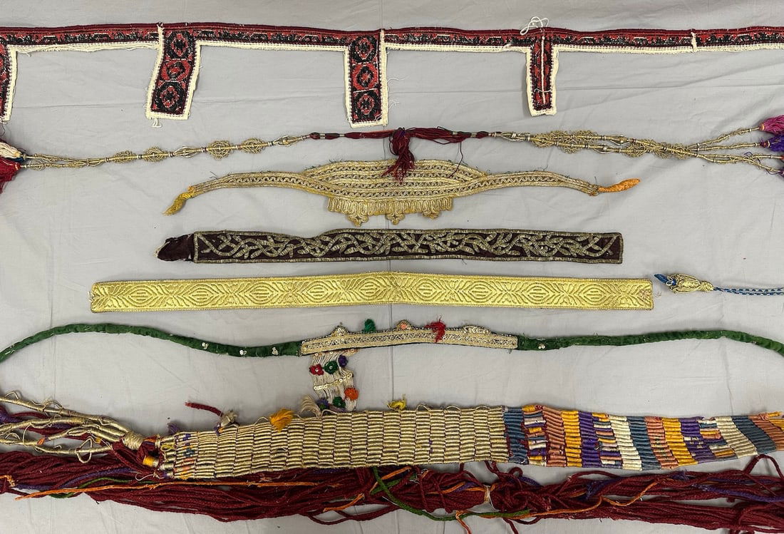 Lot of 8 - Native American and Middle Eastern Belts, Ribbons, Bands: Native American Beaded Belt, Middle Eastern Belt, Gold Jacquard Ribbons Bands, Folklore Band and Bishop Tassel. D: Largest 3" W x 102" L, smallest 2" X 24".
