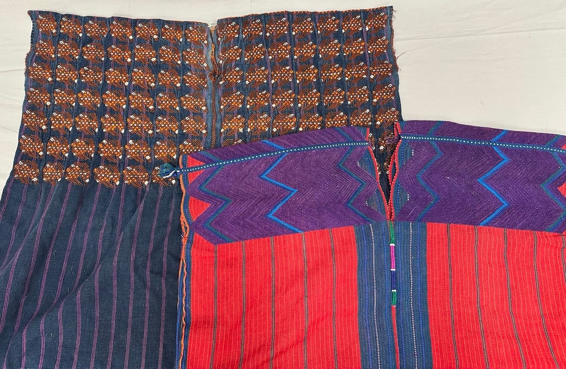 Lot of 2 - Handwoven Nahuala Red and Blue Huipils: Handwoven Nahuala Red and Blue Zacualpa Huipils with traditional motifs. D: Largest 28"W X 26"L, smallest 25"W x 31"L.