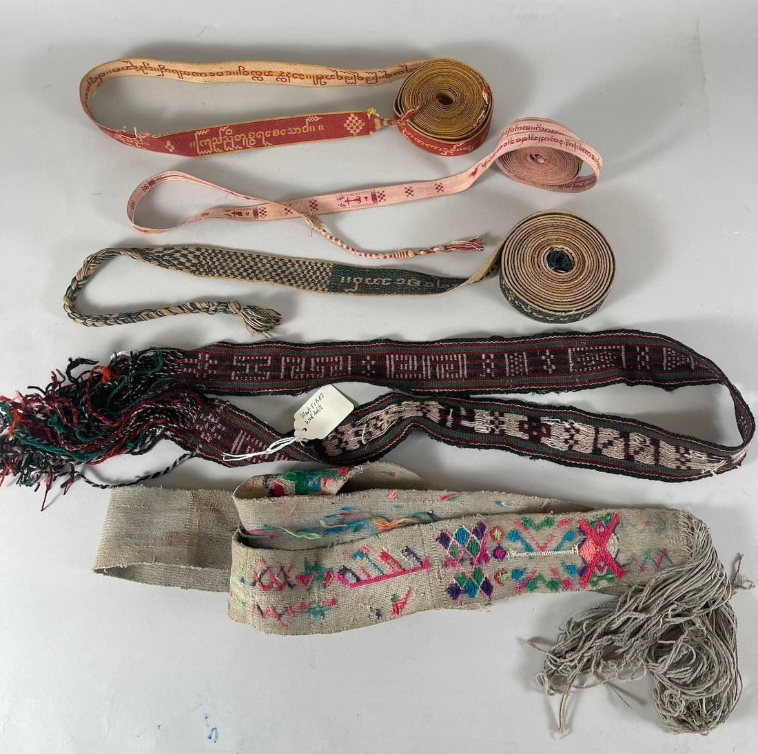 Lot of 5 - Vintage Belts/Trims/Ribbons: Possibly Burmese Ribbons/Trims. West Tibet Wool Belt. D: Longest 160"l x 1"w Shortest 46.5"l x 1.75"w.