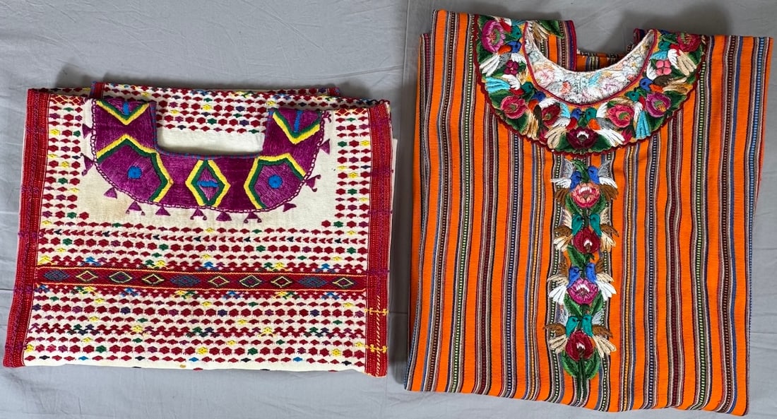 Lot of 2 - Vintage Handmade Guatemalan Huipils, Ex Museum: Guatemalan embroidered huipiles. D: Largest 24"L x 46.5"W, smallest 35.5"L x 29.7"W. PROVENANCE:From Minneapolis Institute of Art