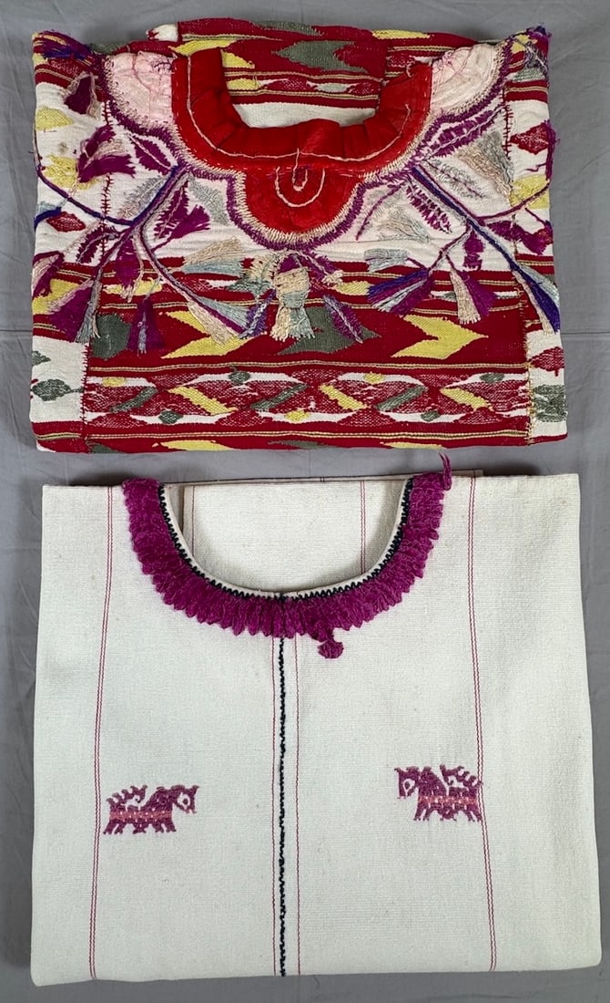 Lot of 2 - Vintage Handmade Ceremonial Huipils Sacapulas Chajul Guatemala, Ex Museum: Ceremonial huipils. 1- Huipil with silk embroidery on neck. Sacapulas, Guatemala. 50 years old. 2- Huipil, traditional indigo randa, Chajul, Guatemala. Made in 1955. D: Largest 21"L x 32.5"W, smallest