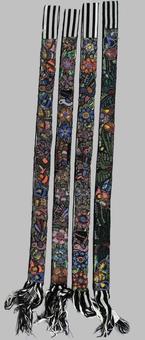 Lot of 4- Vintage Beaded Guatemalan Faja Bohemian Belts, Ex Museum: Guatemalan beaded belts, known as fajas, futures vibrant multicolored embroidery with intricate floral and animal designs. D: Largest 82"L x 2"W, smallest 79"L x 2.25"W. PROVENANCE:From Minneapolis In
