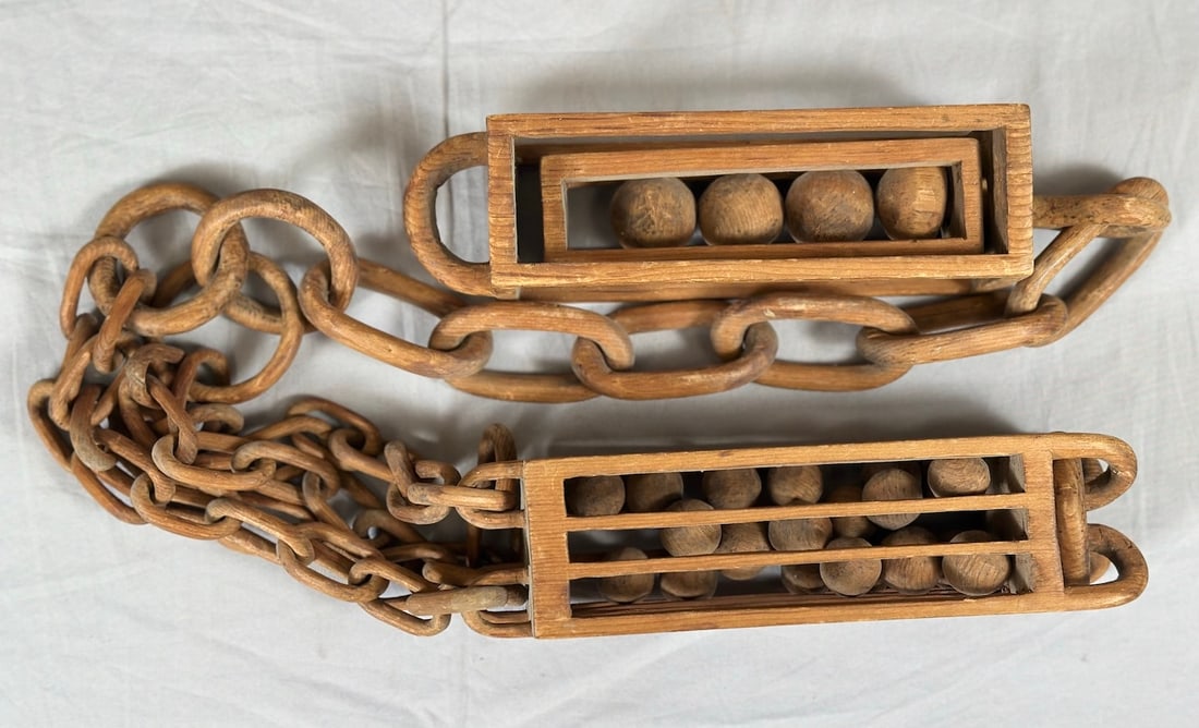 Vintage Hand-Carved Wooden Chain With 'Balls in Cages': Vintage Hand-Carved Wooden Chain With 'Balls in Cages'. Made from a single piece of wood without glue. D: 37" Length.