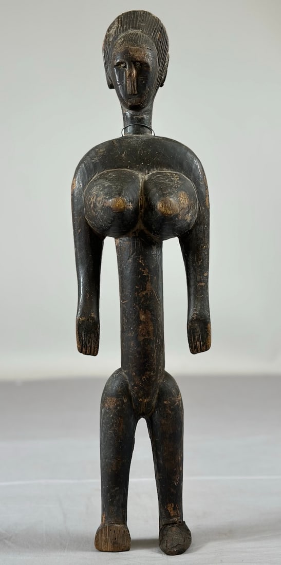 Bamana Female Figure: A carved wood female figure, Bamana peoples, Burkina Faso, West Africa. Approx. 20" x 5.5" x 3.5"
