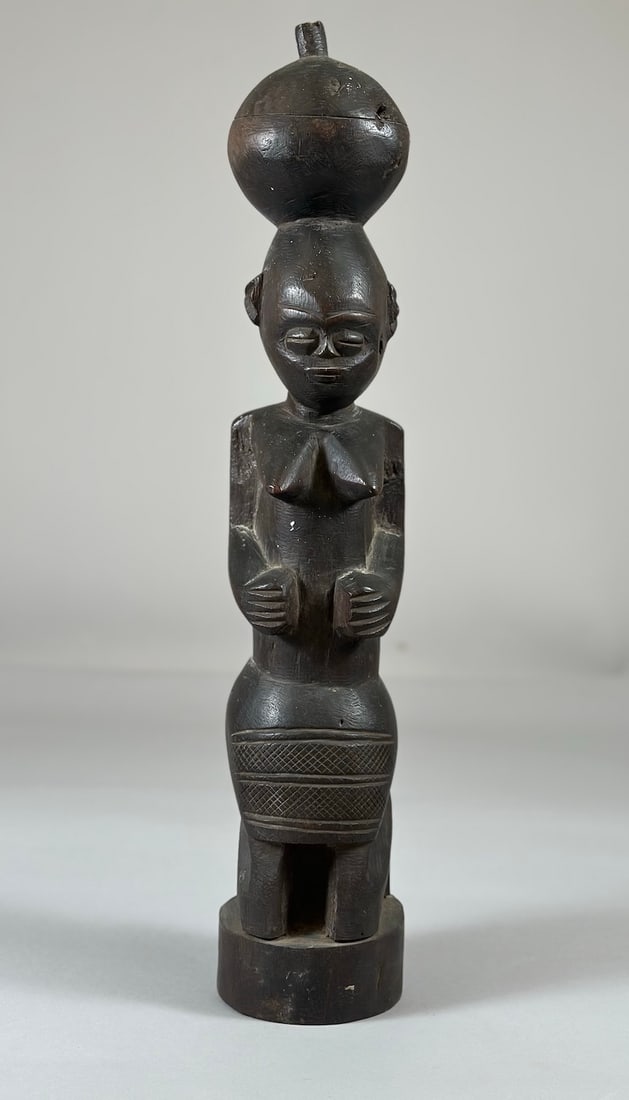 African Wood Figure: Carved wood figure, West or Central Africa. Approx. 22" x 4.5" diameter
