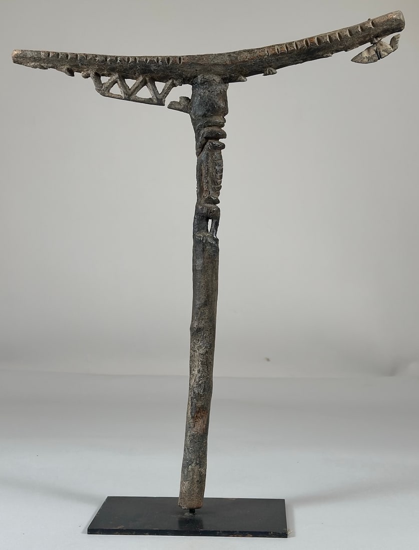A Dogon Seat: A carved wood seat, in the style of a dolaba, Dogon peoples, Mali, West Africa. The professional custom metal base is included. Approx. 21" x 18" x 2.75"