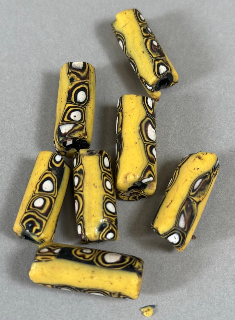 African Trade Beads (7): A collection of 7 African glass trade beads. Largest approx. 1.5" long