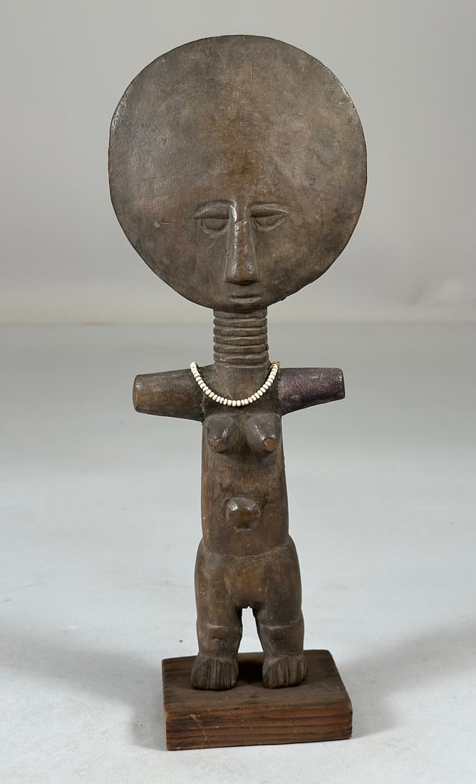 Ashanti Akuaba Doll: A carved wood Akuaba style doll, Ashanti peoples, Ghana, West Africa. Approx. 12.5" x 4.75" x 1.75"