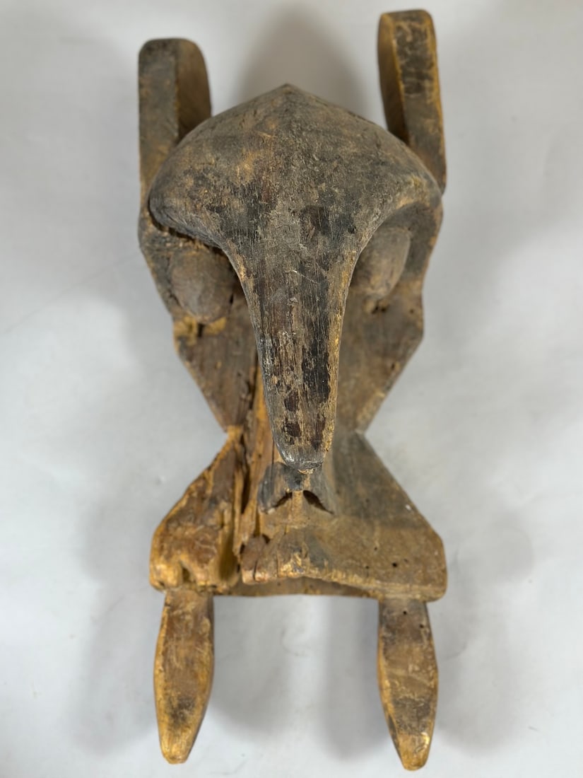 Igbo Elephant Mask: A carved wood elephant mask. Igbo peoples, Nigeria, West Africa. Approx. 21" x 9" x 9"