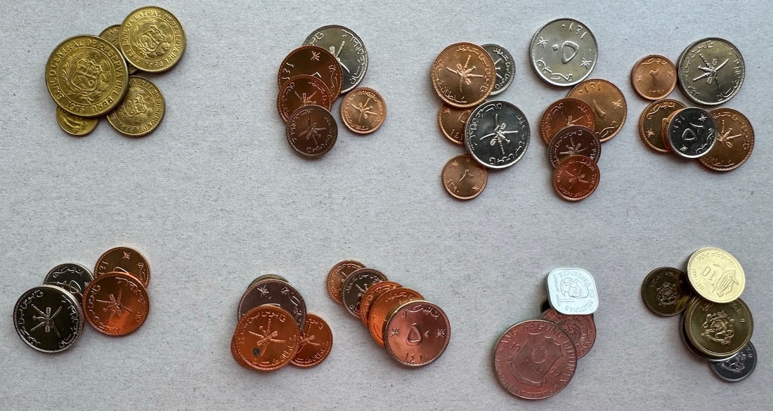 10 Uncirculated Sets  from Oman, Morocco, Peru & Philliphines (1 of 20)