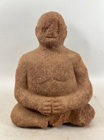 Stone Carved Seated Figure