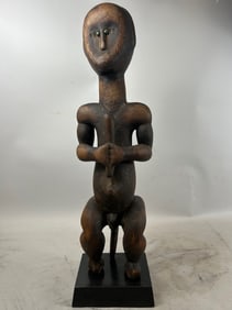 Fang, Gabon, Carved Wood Seated Male Figure with Brass Eyes