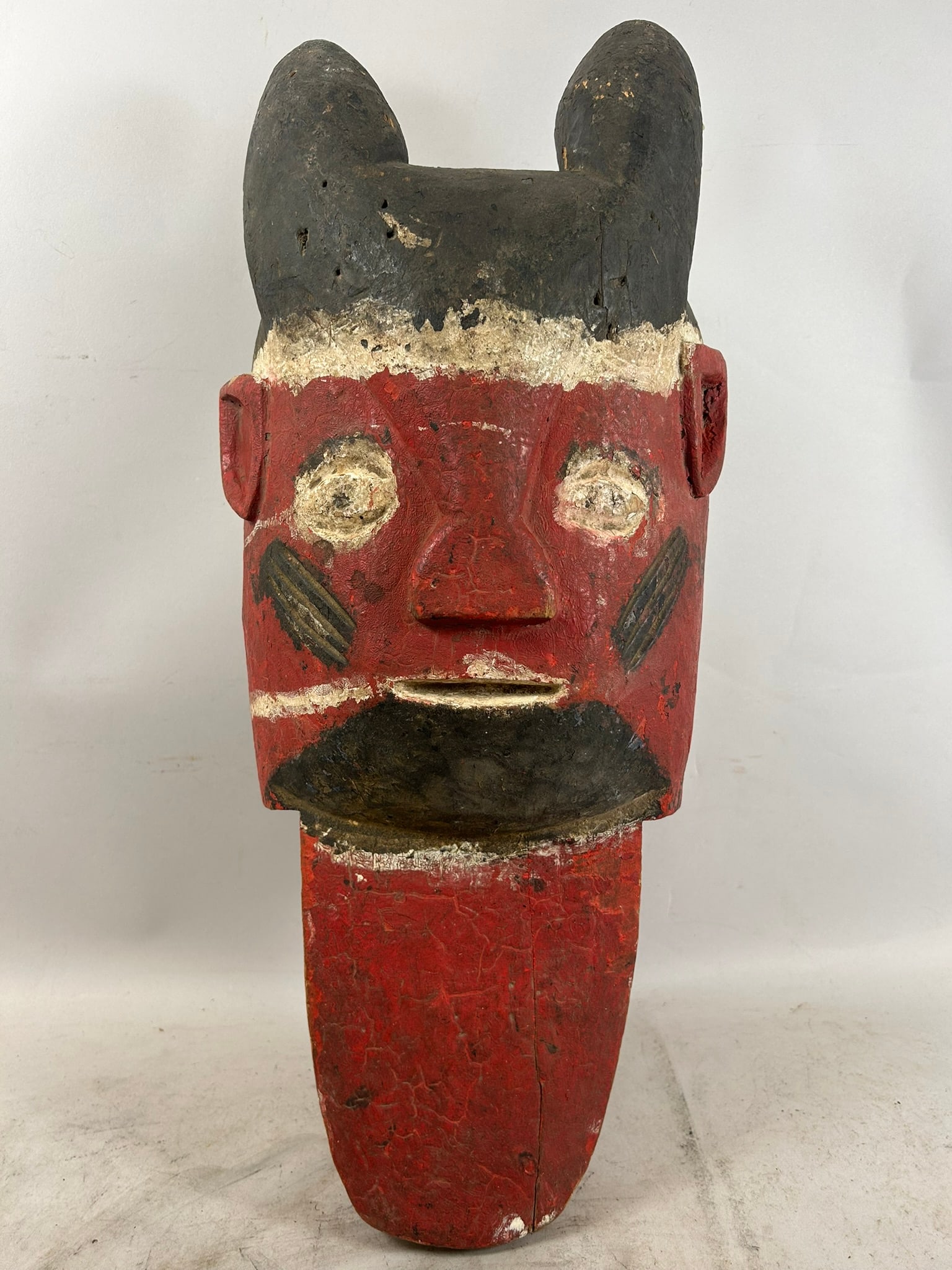 African Painted Wood Carved Mask: African Painted Wood Carved Mask. 22.5"h x 8.5"w x 8.5"l