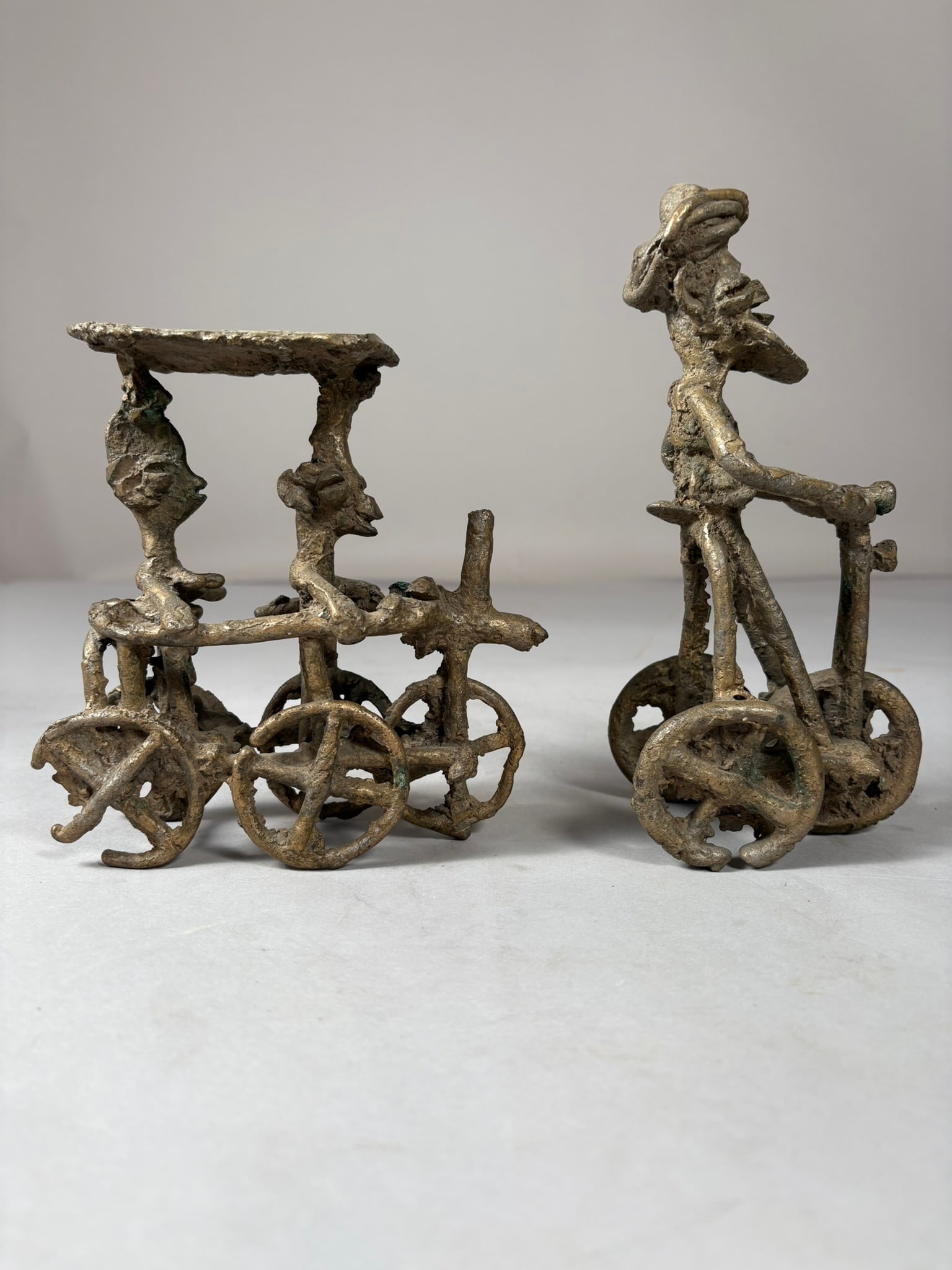 African Contemporary Cast Bronze or Copper Alloy Figurines (2): African Contemporary Cast Bronze or Copper Alloy Figurines (2). D:9"h x 3"w x 4.5"l (tallest)