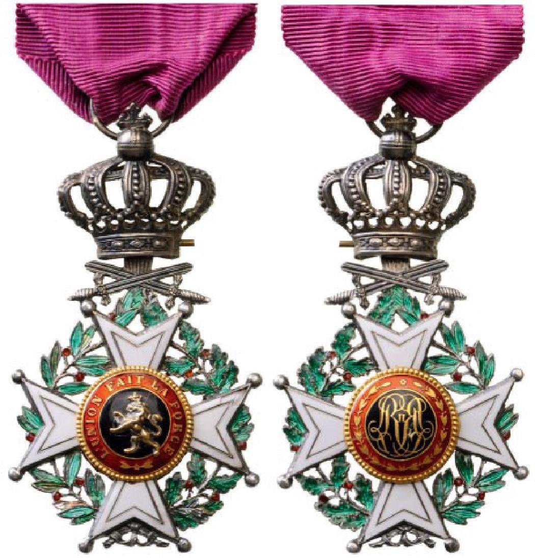 ORDER OF LEOPOLD: Knight's Cross, 5th Class, 2nd Type Military, instituted in 1832. Breast Badge, 73x40 mm, Silver, both central medallions GOLD, both sides enameled, original suspension ring and ribbon. A scarce and b