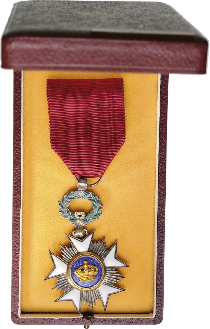 ORDER OF THE CROWN: Knight's Cross, 5th Class, instituted in 1897. Breast Badge, 65x45 mm, Silver partially enameled, both central medallions gilt silver, enameled, original suspension ring and ribbon, in case of issue b
