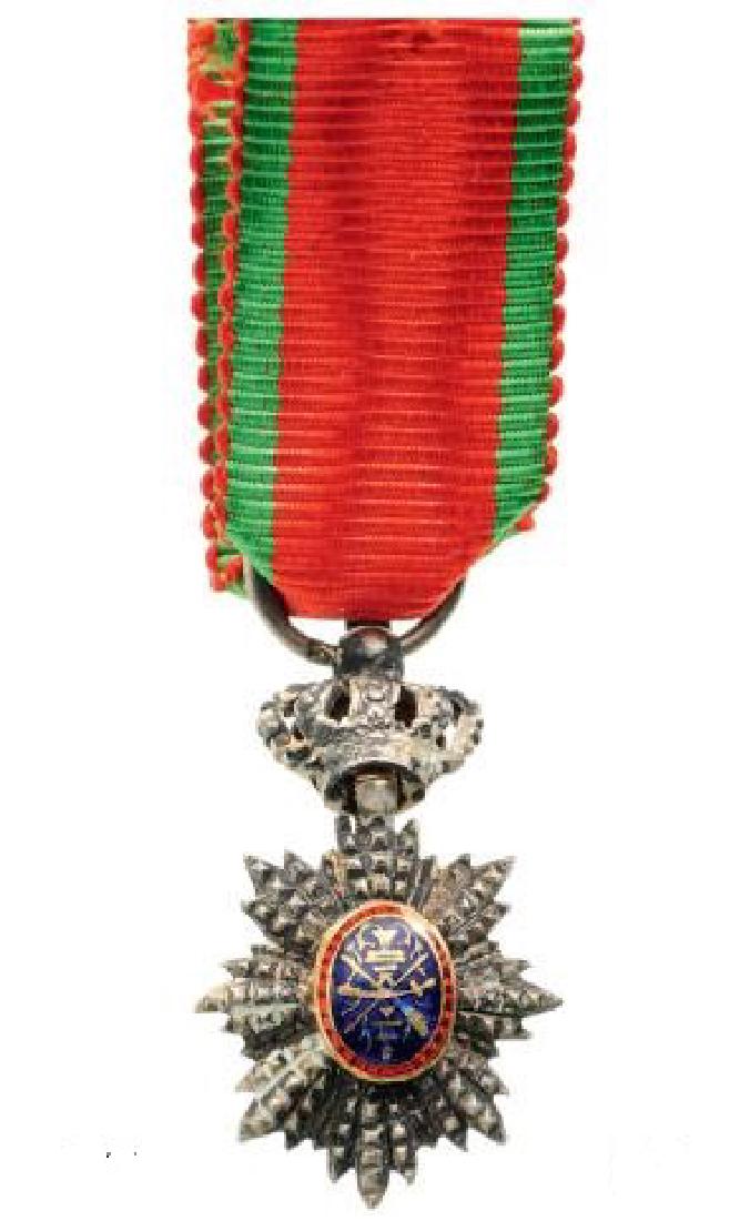 ROYAL ORDER OF CAMBODIA: Knight’s Cross Miniature. Breast Badge with Crown, silver with GOLD centre, 20x11 mm, one side enameled, original ribbon. Extremely fi ne quality and condition! II