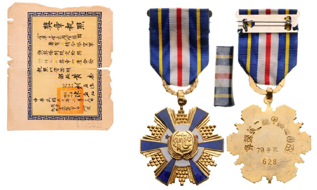 Air Force Distinguished Service Medal: Grade B, 2nd Class. Breast Badge, numbered on reverse "2447", gilt Bronze, 45 mm, multiparts construction, one side enameled, superimposed parts gilt bronze, enameled, with suspension ring, ribbon and