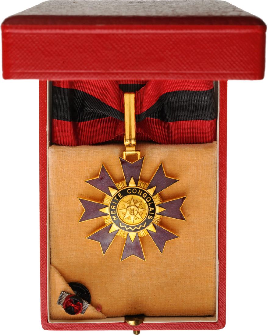 ORDER OF MERIT: Commander 's Cross. Neck Badge, gilt Bronze, 52 mm, enameled, maker 's mark "Arthus Bertrand, Paris", original suspension loop and ribbon, in case of issue by "Arthus Bertrand, Paris". I