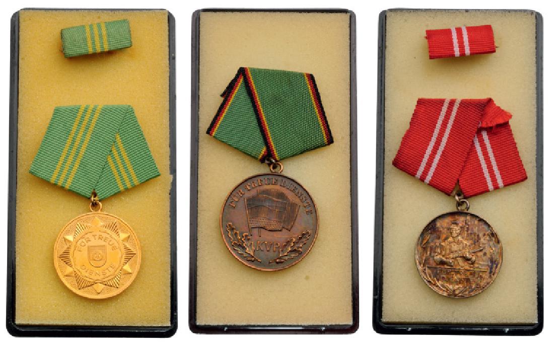 Lot of 3 Decorations: Medal for Long Service in Militarized Organs of the Ministry of Interior (15 Years), Medal for Long Service in Barracked Police, Medal for Long Service in Fighting Groups of Working Class (15 Years).