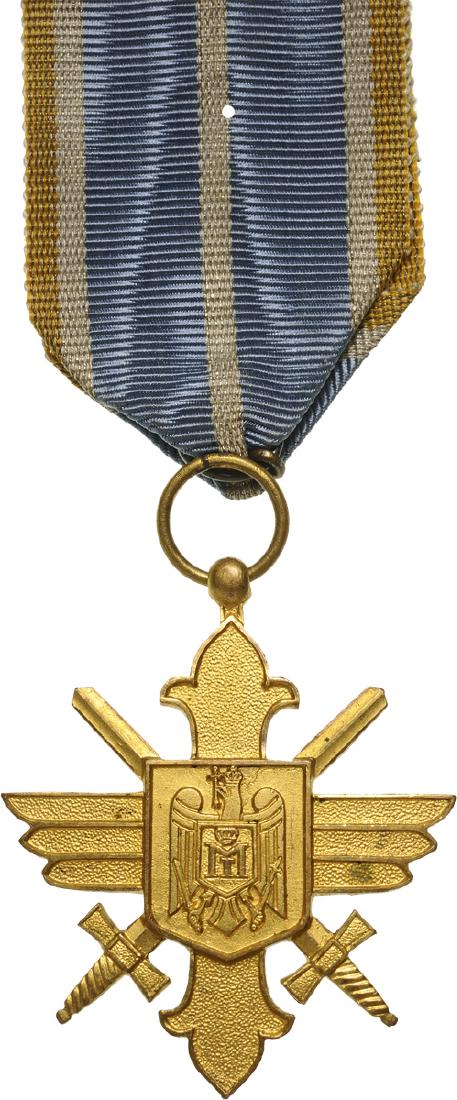ORDER OF THE AERONAUTICAL VIRTUE, 1930: Gold Cross, 2nd Model with cipher of King Michael I, for Military, 1940. Breast Badge, 50x42 mm, gilt Bronze, original suspension ring and ribbon. I