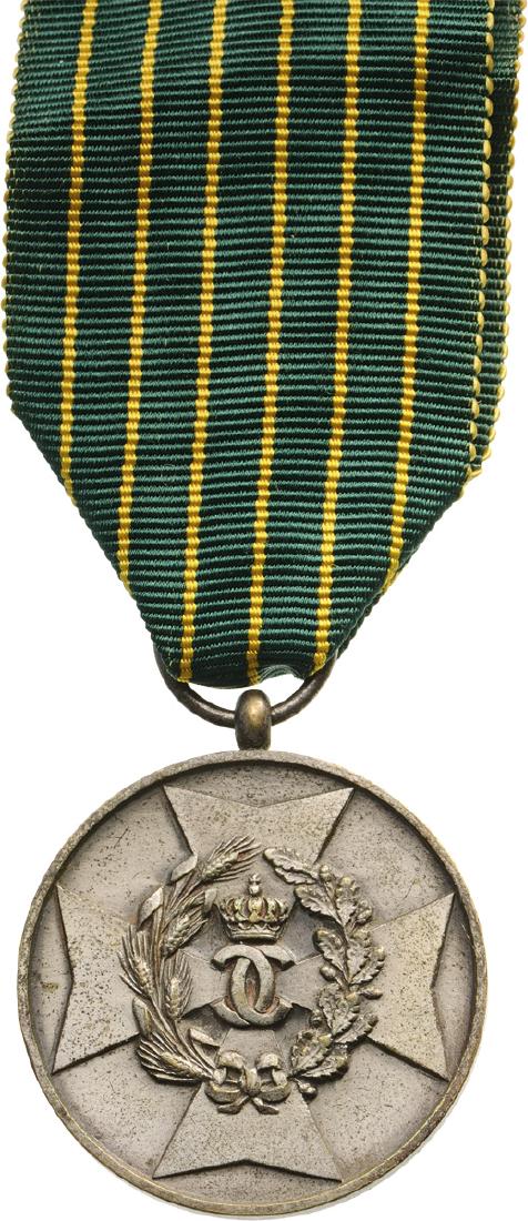 Medal of Agricultural Merit: 2nd Class, 1st Model, instituted in 1932. Breast Badge, 35mm, silvered Bronze, in the centre with Carol II cipher, original suspension ring and correct ribbon. Rare! I R!