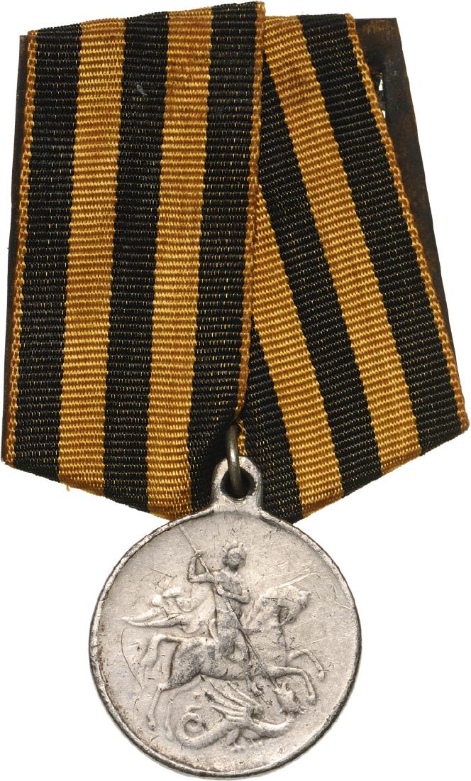 Provisional Government Saint George Medal for Bravery: 4th Class (instituted in 1878). Breast Badge, 27 mm, white Metal (??), numbered on reverse “1325845”, numerous scratches and contact marks, original suspension ring and later pentagonal ribbon. II