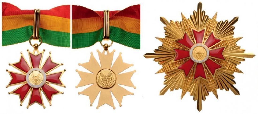 ORDER OF THE 1000 HILLS: Grand Officer's Set, 2nd Class. Neck Badge, 50 mm, gilt Bronze, obverse enameled, central medallion gilt bronze, enameled, with original suspension ring, loop and ribbon. Breast Star, 97 mm, gilt Bron