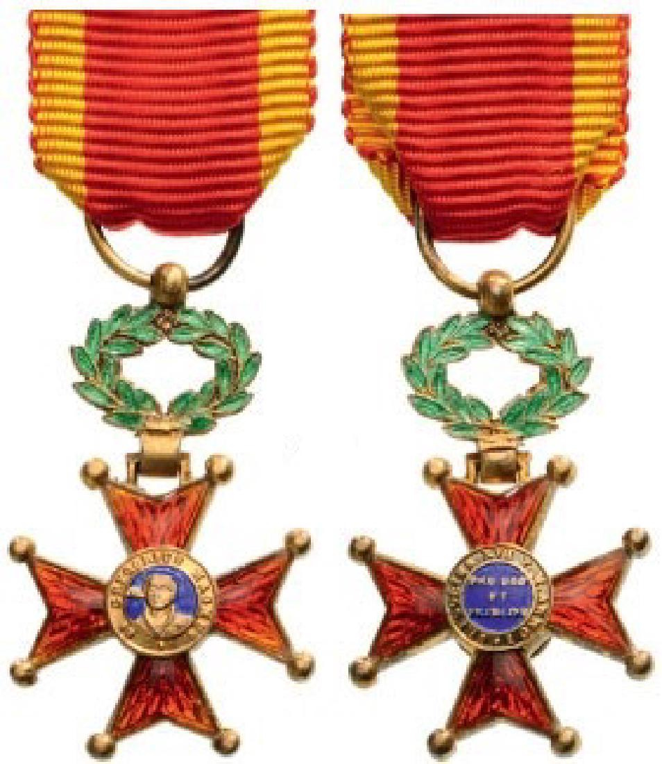 ORDER OF SAINT GREGORY: Knight's Cross Miniature, 5th Class, instituted in 1831. Breast Badge, 23x15 mm, gilt Silver, enameled, both central medallions enameled, original suspension wreath, ring and ribbon. A very fine minia