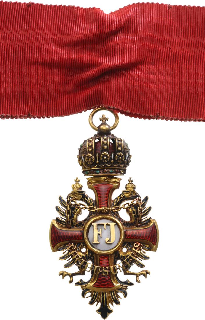 ORDER OF FRANZ JOSEPH: Commanderâ€™s Cross, 3rd Class, instituted in 1849. Neck Badge, 70x36 mm, GOLD, approx. 20 g, both sides enameled, hallmarked "3A", maker's mark Â« VM (Vincent Mayer) Â», both central medalli