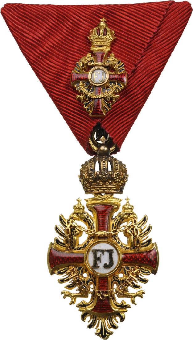 ORDER OF FRANZ JOSEPH: Knightâ€™s Cross, instituted in 1849. Breast Badge, 55.5x30.8 mm, GOLD, enameled, makerâ€™s mark â€œGebr. Resch, Vienna (earlier than 1867)â€ and gold marks, hinged reverse centre med