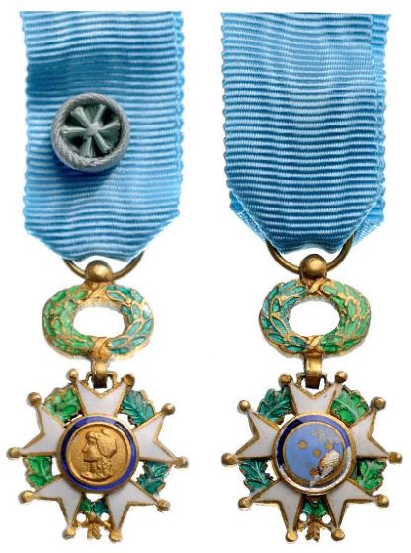 ORDER OF THE SOUTHERN CROSS: Officerâ€™s Cross Miniature. Breast Badge, gilt Bronze, 15 mm, enameled, original suspension ring and ribbon with rosette. IIÂ 250