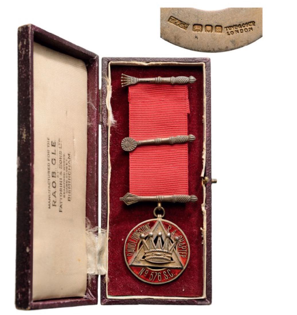 Masonic Decoration, David Livingstone R.A. Chapter: Breast Badge, 42 mm, gilt Silver, British hallmark and makerâ€™s mark â€œToye&Coâ€, obverse enameled, original suspension device and ribbon with ornamented clasps, named to â€œM.E.Comp