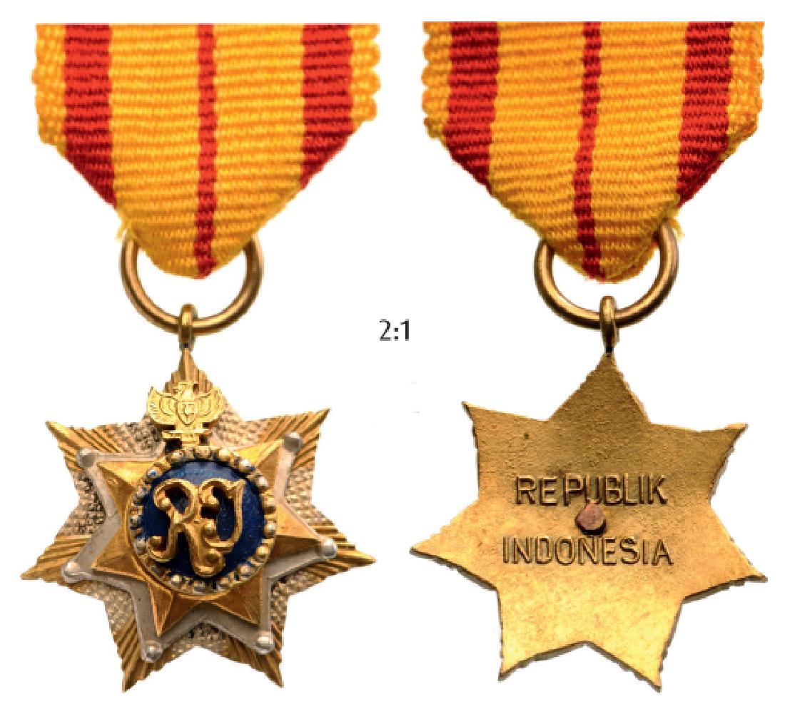 ORDER OF THE STAR OF REPUBLIC (BINTANG REPUBLIK: Knightâ€™s Cross Miniature. Breast Badge, 23 mm, gilt Silver, superimposed parts enameled, original suspension ring and ribbon. Inscription on the back "REPUBLIK INDONESIA". I R! 1701