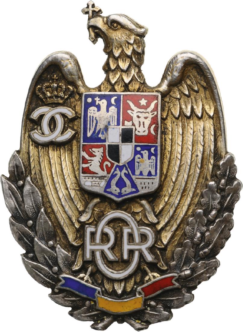 BADGE OF THE RESERVE AND RETIRED OFFICERS, "KING CAROL: Breast Badge, 52x38 mm, Silver, makerâ€™s mark Â«Â KKÂ Â», hallmarked Â«Â 900Â Â», numbered Â«Â 37Â Â», with thin pin on reverse, I.M.S.P.R. 054. Scarce badge in extremely