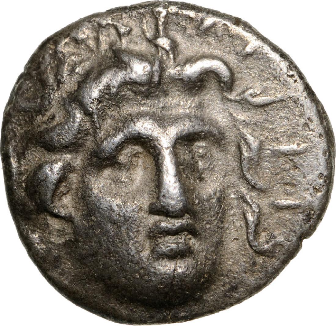 Rhodes, AR Hemidrachm (12 mm, 1.35 g), 170-150 BC: Head of Helios facing / Rose, magistrate name ?IONY?IO?. Jenkins, Rhodian, Group B, 42. VF+ 3769