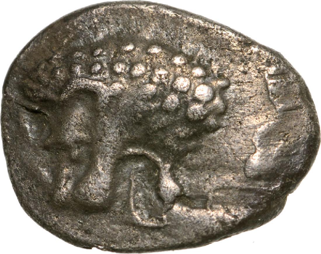 Unknown mint, AR Hemiobol (8 mm, 0.42 g), Hyssaldomos,: Head of a lion left / Head of a lion facing. Konuk 1.3. R! VF+, dark patina 3795