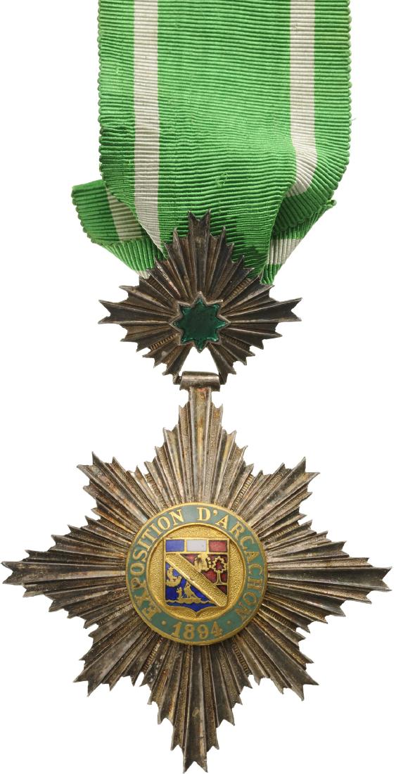 Arcachon Exhibition Badge: Breast Badge, 91x63 mm, Silver, one-side enameled, central medallions gilt silver, original suspension ring and ribbon. Very attractive! I